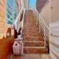 Bespoke-Synergy-Straight-Stairlift-Near-Staircase.jpg
