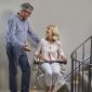 Couple-Happly-Talking-While-Using-Bespoke-Synergy-Straight-Stairlift.jpg