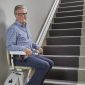 Man-Sitting-on-Bespoke-Synergy-Straight-Stairlift.jpg