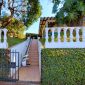 Open-Bespoke-Synergy-Straight-Stairlift-Outside-Home.jpg