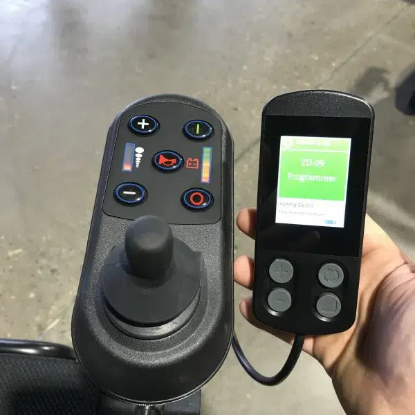 Programmer for Foldable Electric Wheelchairs Connected on Wheelchair