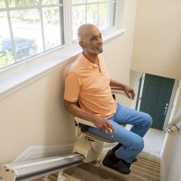 Old Man Using Harmer SL600 Straight Stair Lift